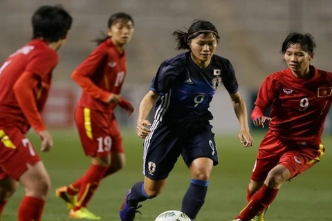 Đội tuyển nữ Việt Nam (áo đỏ) đã có bàn thắng đầu tiên vào lưới Nhật Bản. (Ảnh: AFC)