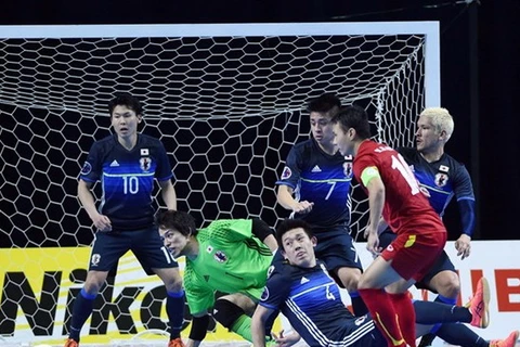 Futsal Việt Nam (áo đỏ) từng làm nên kỳ tích trước nhà vô địch châu Á Nhật Bản. (Ảnh: VFF)