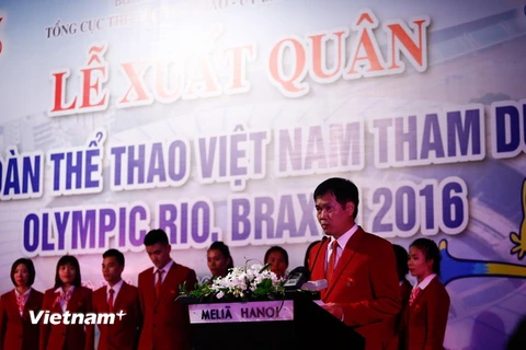 Trưởng đoàn Trần Đức Phấn tuyên bố quyết tâm trong lễ xuất quân của thể thao Việt Nam. (Ảnh: Minh Chiến/Vietnam+)