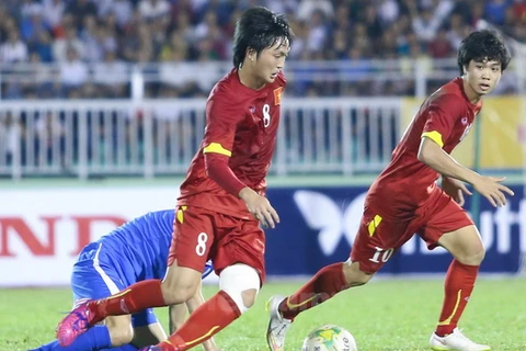 Tuấn Anh (số 8) và Công Phượng là những hy vọng mới của bóng đá Việt Nam. (Ảnh: Minh Chiến/Vietnam+)