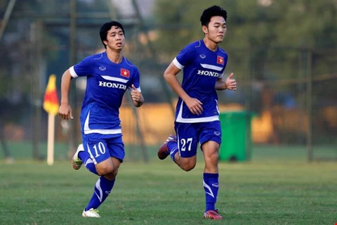 Công Phượng (trái) cạnh tranh vị trí đội trưởng U23 Việt Nam với đồng đội Xuân Trường (phải).