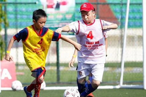Trại Hè bóng đá Toyota đã giúp trẻ em Việt Nam có nhiều cơ hội tiếp xúc với bóng đá chuyên nghiệp hơn. (Ảnh: Minh Chiến/Vietnam+)