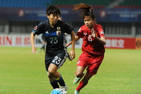 U19 nữ Việt Nam (áo đỏ) không thể kháng cự lại sức mạnh của Nhật Bản. (Ảnh: AFC)