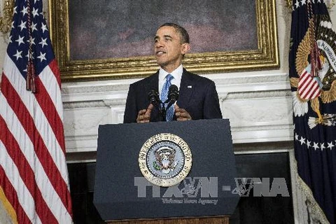 Tổng thống Mỹ phát biểu tại Nhà Trắng sau khi thỏa thuận về việc tạm ngừng chương trình hạt nhân Iran đã đạt được tại Geneva, Thụy Sĩ ngày 23/11. (Nguồn: AFP/TTXVN)