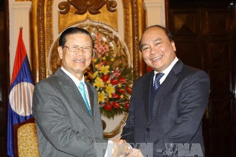 Phó Thủ tướng Lào làm việc với Ngân hàng Nhà nước