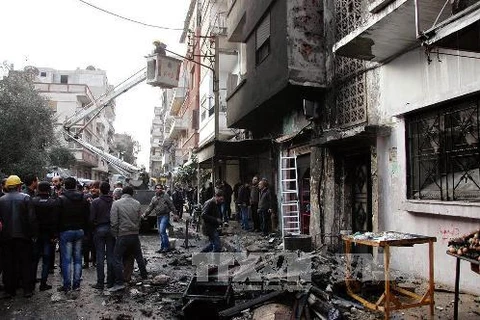 Hiện trường vụ tấn công ở al-Mahattah, khu vực lân cận thành phố Homs ngày 9/1. (Nguồn: AFP/TTXVN)