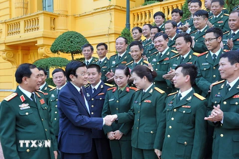 Chủ tịch nước Trương Tấn Sang với các đại biểu. (Ảnh: Trọng Đức/TTXVN)