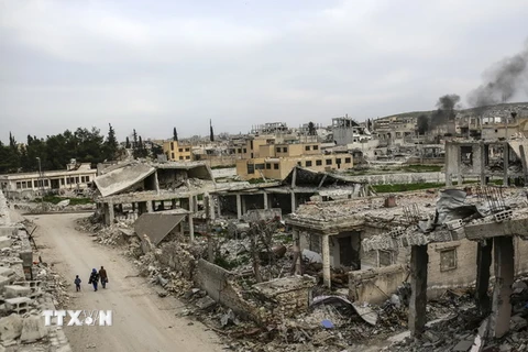 Một ngôi làng tại thị trấn Kobane, Syria bị phá hủy ngày 27/3/2015. (Nguồn: AFP/TTXVN)