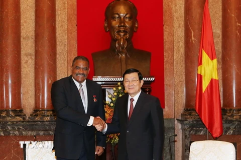 Chủ tịch nước Trương Tấn Sang tiếp Chánh án Tòa án nhân dân Tối cao Cộng hòa Cuba Rubén Remigio Ferro đang ở thăm và làm việc tại Việt Nam. (Ảnh: Nguyễn Khang/TTXVN)