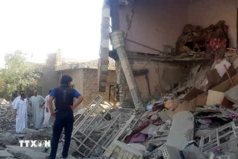 Một tòa nhà bị phá hủy sau cuộc không kích ở Fallujah. (Nguồn: THX/TTXVN)