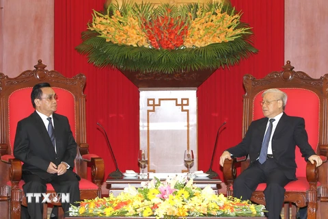 Tổng Bí thư Nguyễn Phú Trọng tiếp Thủ tướng Lào Thoongsing Thammavong. (Ảnh: Trí Dũng/TTXVN)