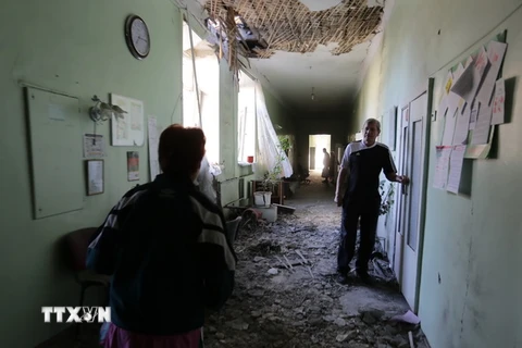 Một bệnh viện ở khu vực Donetsk bị phá hủy trong các vụ tấn công ngày 19/7. (Nguồn: AFP/TTXVN)
