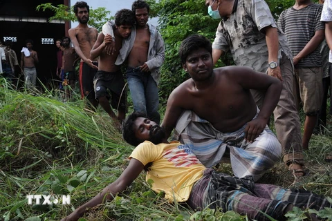 Người di cư tại khu vực lều tạm ở Kuala Langsa, tỉnh Aceh, Indonesia ngày 15/5, sau khi được cứu sống trên biển. Ảnh minh họa. (Nguồn; AFP/TTXVN)