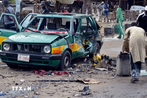 Hiện trường một vụ đánh bom ở Nigeria. (Nguồn: AFP/TTXVN)