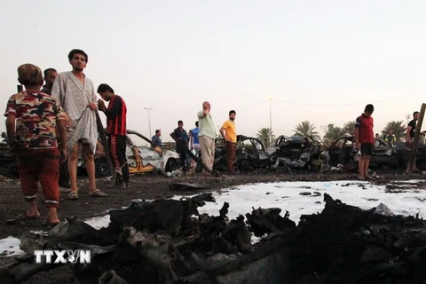 Hiện trường một vụ đánh bom ở Sadr ngày 15/8. (Nguồn: AFP/TTXVN)