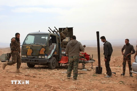 Binh sỹ Syria tại làng Jihar sau chiến dịch truy quét ngày 8/3. (Nguồn: AFP-TTXVN)