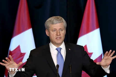 Thủ tướng Canada Stephen Harper trong cuộc họp báo về Hiệp định TPP tại Ottawa, ngày 5/10.(Nguồn: Reuters/TTXVN)
