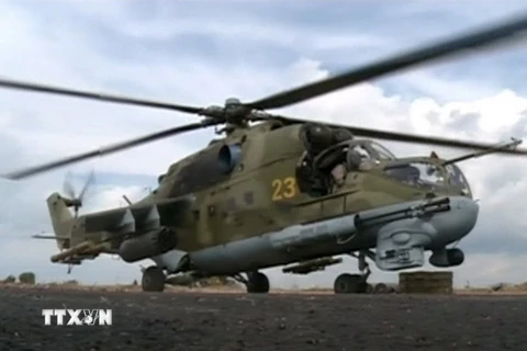 Trực thăng không quân Nga tham gia chiến dịch không kích chống IS tại căn cứ Heymim gần thị trấn Latakia, Syria ngày 6/10. (Nguồn: Reuters/TTXVN)