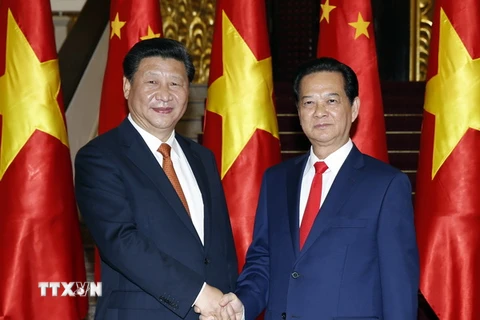 Thủ tướng Nguyễn Tấn Dũng hội kiến Tổng Bí thư, Chủ tịch nước Trung Quốc Tập Cận Bình thăm cấp Nhà nước Việt Nam. (Ảnh: Đức Tám/TTXVN)