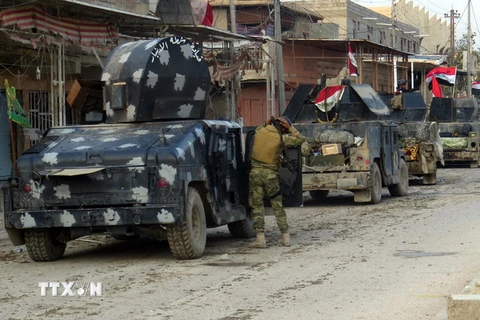 Lực lượng ủng hộ Chính phủ Iraq sau các cuộc giao tranh tại thành phố Ramadi, tỉnh Anbar ngày 1/1/2016. (Nguồn: AFP/TTXVN)