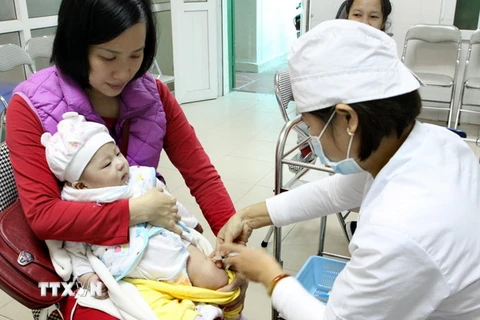 Trạm y tế phường Trương Định, quận Hai Bà Trưng là một trong 577 điểm tiêm chủng mở rộng của Hà Nội luôn đảm bảo quy trình an toàn tiêm chủng. (Ảnh: Dương Ngọc/TTXVN)
