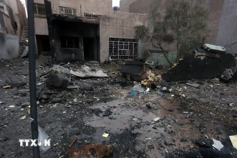 Hiện trường vụ tấn công ở Đông Baghdad ngày 12/1. (Nguồn: AFP/TTXVN)