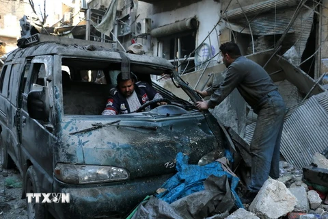 Cảnh đổ nát sau các cuộc giao tranh giữa quân đội chính phủ và phiến quân tại thành phố Aleppo, miền Nam Syria ngày 16/1. (Nguồn: AFP/TTXVN)