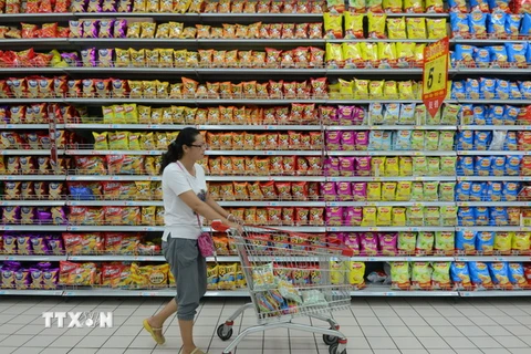 Hàng hóa được bày bán tràn ngập tại các siêu thị ở Trung Quốc. (Nguồn: AFP/TTXVN)