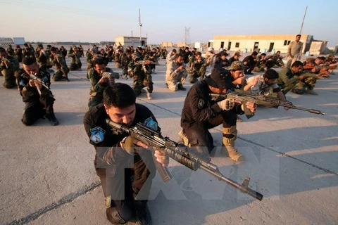 Lực lượng tự vệ Iraq tham gia cuộc diễn tập quân sự ở al-Zubair, gần thành phố miền nam Basra ngày 13/2. (Nguồn: AFP/TTXVN)