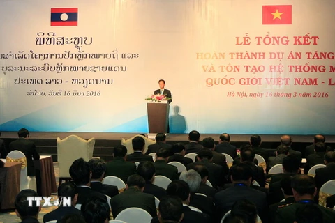 Thủ tướng Nguyễn Tấn Dũng phát biểu tại Lễ tổng kết hoàn thành Dự án Tăng dày và tôn tạo hệ thống mốc quốc giới Việt Nam-Lào. (Ảnh: Thống Nhất/TTXVN)