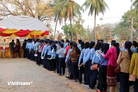 Người dân Lào đi bầu cử. (Ảnh: Phạm Kiên/Vietnam+)