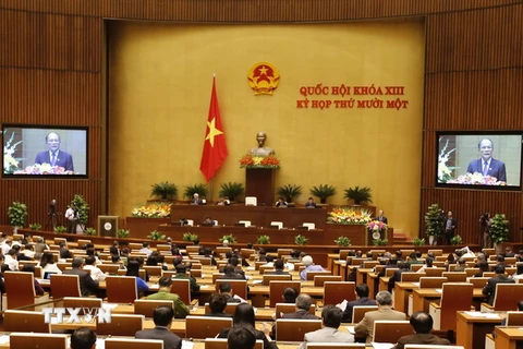 Chủ tịch Quốc hội Nguyễn Sinh Hùng trình bày dự thảo Báo cáo công tác nhiệm kỳ khóa XIII của Quốc hội ngày 22/3. (Ảnh: An Đăng/TTXVN)