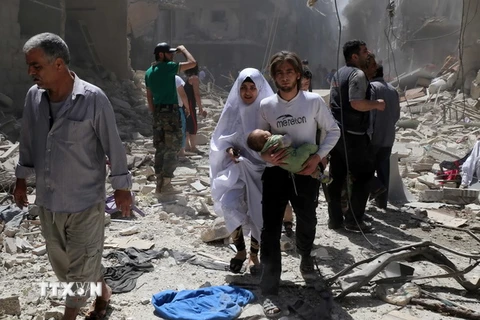 Cảnh đổ nát sau các cuộc giao tranh tại thành phố Aleppo ngày 28/4. (Nguồn: AFP/TTXVN)