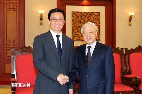 Tổng Bí thư Nguyễn Phú Trọng tiếp ông Hàn Chính, Ủy viên Bộ Chính trị, Bí thư thành phố Thượng Hải (Trung Quốc) đang ở thăm Việt Nam. (Ảnh: Trọng Đức/TTXVN)