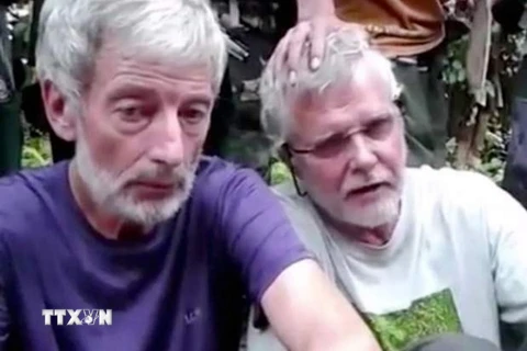 Hai con tin người Canada bị Abu Sayyaf bắt cóc Robert Hall (trái) và John Ridsdel. (Nguồn: National Post/TTXVN)