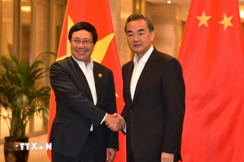 Phó Thủ tướng, Bộ trưởng Ngoại giao Phạm Bình Minh hội kiến với Bộ trưởng Ngoại giao Trung Quốc Vương Nghị. (Ảnh: Hải Yến/TTXVN)