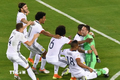 Niềm vui chiến thắng của các cầu thủ Colombia. (Nguồn: AFP/TTXVN)