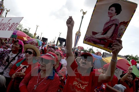 Lực lượng Áo đỏ ủng hộ chính phủ tuần hành tại Bangkok năm 2014. (Nguồn: AFP/TTXVN)