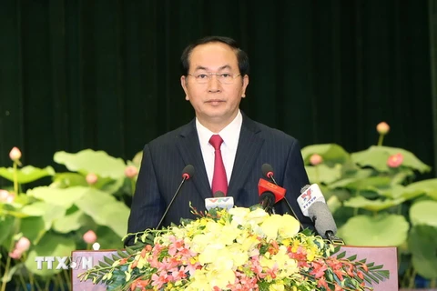 Chủ tịch nước Trần Đại Quang đến dự và phát biểu tại Lễ kỷ niệm 40 năm thành phố Sài Gòn-Gia Định vinh dự mang tên Chủ tịch Hồ Chí Minh. (Ảnh: Nhan Sáng/TTXVN)