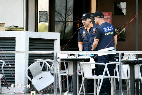 Cảnh sát Malaysia điều tra tại hiện trường một vụ tấn công. (Nguồn: AFP/TTXVN)