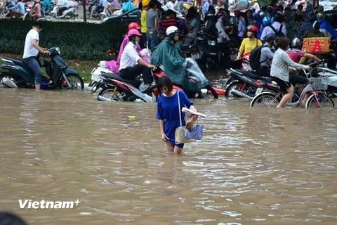 Hà Nội ngập thành sông sau trận mưa lớn hồi tháng 5. (Ảnh: PV/Vietnam+)