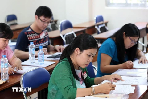 Các giáo viên chấm thi tại trường Đại học Sư Phạm TP. Hồ Chí Minh. (Ảnh: Phương Vy/TTXVN)