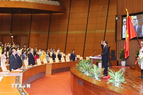 Chủ tịch nước Trần Đại Quang tuyên thệ nhậm chức. (Ảnh: Trọng Đức/TTXVN)