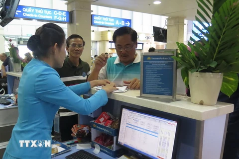 Sân bay Tân Sơn Nhất hoạt động ổn định trở lại sau sự cố tin tặc. (Ảnh: Hoàng Hải/TTXVN)