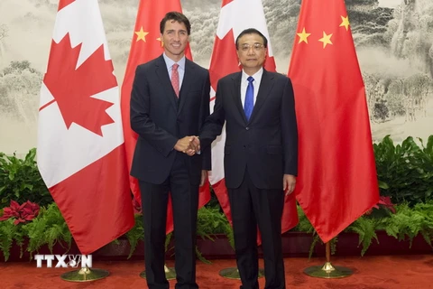 Thủ tướng Trung Quốc Lý Khắc Cường (phải) và người đồng cấp Canada Justin Trudeau. (Nguồn: THX/TTXVN)