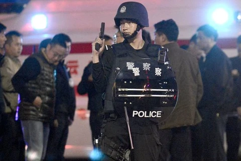 Cảnh sát làm nhiệm vụ tại Côn Minh. (Nguồn: AFP)