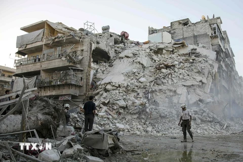 Cảnh đổ nát do xung đột ở Qatarji, ngoại ô thành phố Aleppo ngày 17/10. (Nguồn: AFP/TTXVN)