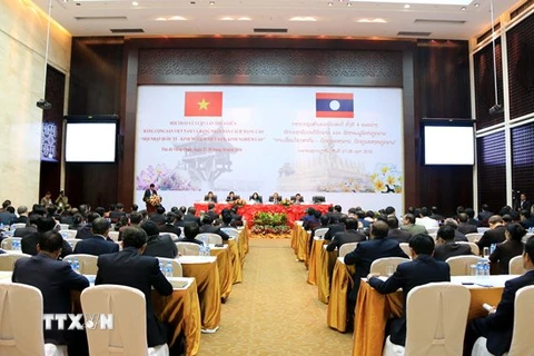 Hội thảo lý luận lần thứ 4 giữa Đảng Cộng sản Việt Nam và Đảng Nhân dân Cách mạng Lào. (Ảnh: Phạm Kiên/TTXVN)