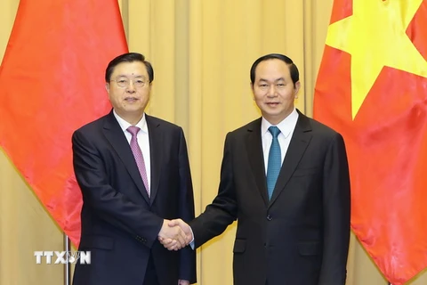 Chủ tịch nước Trần Đại Quang đã tiếp Ủy viên Thường vụ Bộ Chính trị, Ủy viên trưởng Ủy ban Thường vụ Đại hội đại biểu nhân dân toàn quốc (Nhân đại) Trung Quốc Trương Đức Giang. (Ảnh: Nhan Sáng/TTXVN)