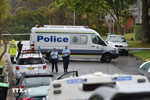 Cảnh sát Australia tại một cuộc điều tra ở New South Wales ngày 17/10. (Nguồn: EPA/TTXVN)